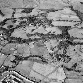 Cochno, general view.  Oblique aerial photograph taken facing north.  This image has been produced from a damaged negative.