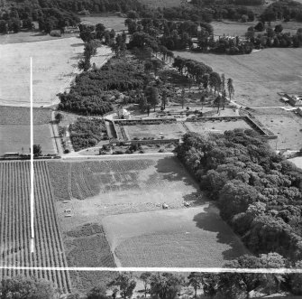 Newbyth Farmhouse and Walled Garden, Whitekirk.  Oblique aerial photograph taken facing south.  This image has been produced from a crop marked negative.