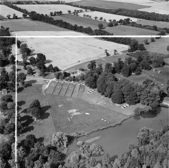 Newbyth Farm and Stables, Whitekirk.  Oblique aerial photograph taken facing north.  This image has been produced from a crop marked negative.