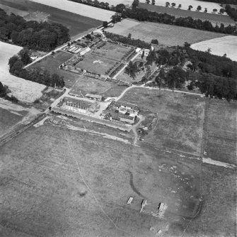 Newbyth Mains and Walled Garden, Whitekirk.  Oblique aerial photograph taken facing north-east.
