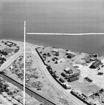 Former Seaplane Base, Stannergate Road, Dundee.  Oblique aerial photograph taken facing south-east.  This image has been produced from a crop marked negative.