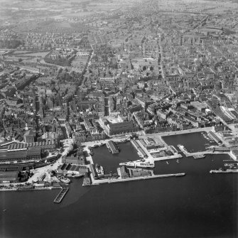 Dundee, general view, showing King William IV Dock and Dundee Royal Infirmary.  Oblique aerial photograph taken facing north.
