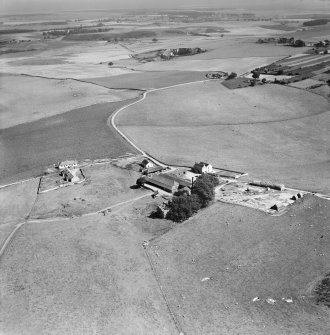 Cruivie Castle and Farm, Logie.  Oblique aerial photograph taken facing south-east.