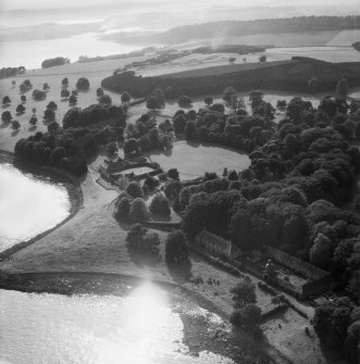 Donibristle House and Stables, Dalgety Bay.  Oblique aerial photograph taken facing west.