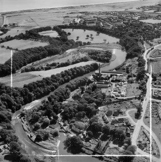 Aberdeen, general view, showing Donside Paper Co. Ltd. Donside Mills and Seaton Park.  Oblique aerial photograph taken facing south-east.  This image has been produced from a crop marked negative.