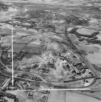 Motherwell, general view, showing Stewarts and Lloyds Ltd. Clydesdale Steel and Tube Works, Clydesdale Street and St Patrick's Cemetery.  Oblique aerial photograph taken facing south.  This image has been produced from a crop marked negative.