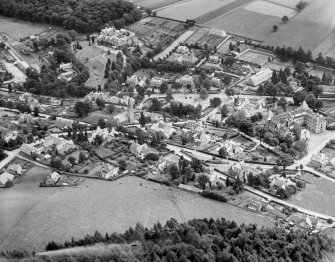 Strathpeffer, general view, showing Strathpeffer Free Church and Ben Wyvis Hotel.  Oblique aerial photograph taken facing east.