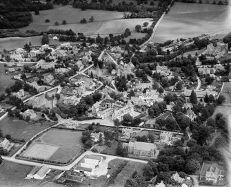 Strathpeffer, general view, showing Highland Hotel and Strathpeffer Free Church.  Oblique aerial photograph taken facing north-east.