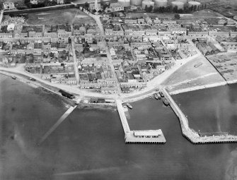 Invergordon, general view, showing Invergordon Harbour and King Street.  Oblique aerial photograph taken facing north.
