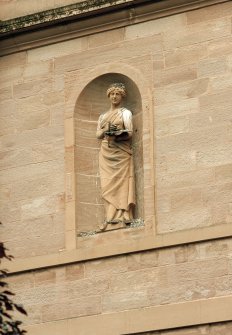 Detail of statue in niche on main facade.