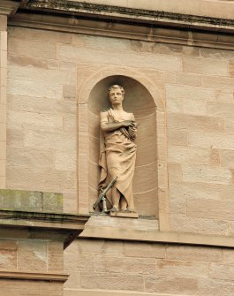 Detail of statue in niche on main facade.