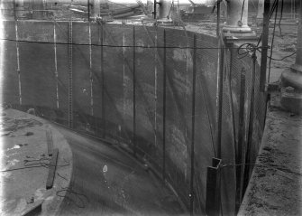 General view of spiral guides and guide carriages being fitted to tank of Number 4 Meadowflats Gasholder Station, Holyrood Road, Edinburgh.