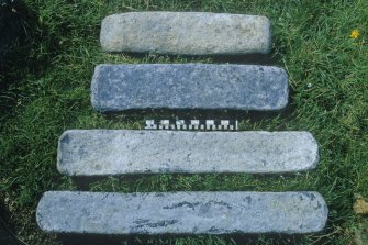 The four lead-ingot types (undersides). Scale in centimetres and inches.