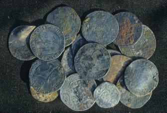 Silver coins recovered from the wreck-site. Many are damaged, abraded, or otherwise illegible, but they include ducatons of the United Provinces and Spanish coins of Philip IV (1621-1665).
