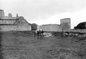 View from East showing opening in East curtain wall (now blocked) of Craigmillar Castle.