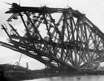 View of the Fife erection under construction seen from the Fife shore.
Insc. 'North Tower, Forth Bridge. 6790. G.W.W. Height - 369 ft.'
Mount insc. 'Forth Bridge. G.W.W.'
Lantern slide.
