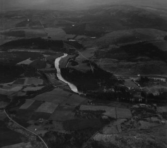 Crathie and Balmoral Castle, Balmoral Estate.  Oblique aerial photograph taken facing south-east.  This image has been produced from a print.