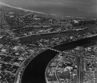 Aberdeen, general view, showing Victoria Bridge and Albert Basin.  Oblique aerial photograph taken facing north-east.  This image has been produced from a print.