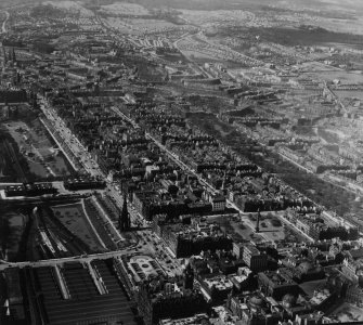 Edinburgh, general view, showing Princes Street and Queen Street Gardens.  Oblique aerial photograph taken facing west.  This image has been produced from a print.