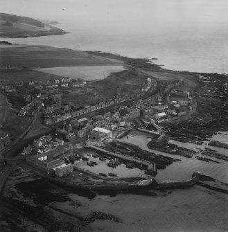 Gourdon, general view, showing Gourdon Harbour and Queen Street.  Oblique aerial photograph taken facing north-east.  This image has been produced from a print.
