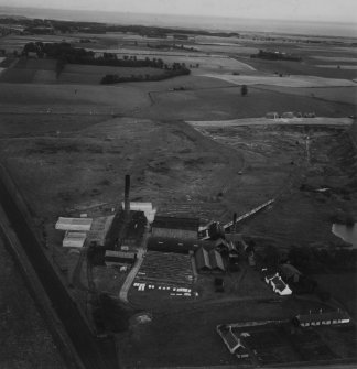 J Tulloch and Co. Ltd. Brick and Tile Works, Pugeston.  Oblique aerial photograph taken facing east.  This image has been produced from a print.