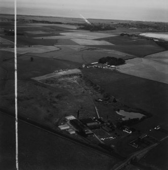 J Tulloch and Co. Ltd. Brick and Tile Works, Pugeston.  Oblique aerial photograph taken facing east.  This image has been produced from a crop marked print.
