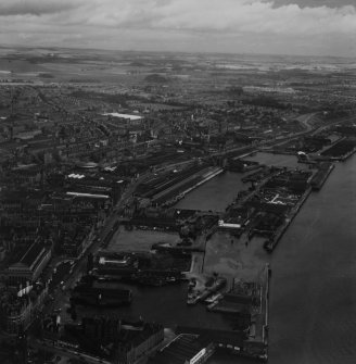 Dundee, general view, showing King William IV Dock and East Dock Street.  Oblique aerial photograph taken facing north-east.  This image has been produced from a print.