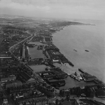 Dundee Docks.  Oblique aerial photograph taken facing east.  This image has been produced from a print.