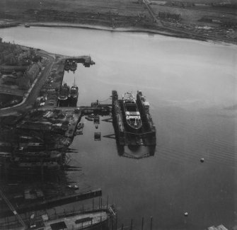 Dry Dock, Pocra Quay, Aberdeen Harbour.  Oblique aerial photograph taken facing south-east.  This image has been produced from a print.