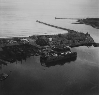 Dry Dock, Pocra Quay and North Pier, Aberdeen Harbour.  Oblique aerial photograph taken facing east.  This image has been produced from a print.