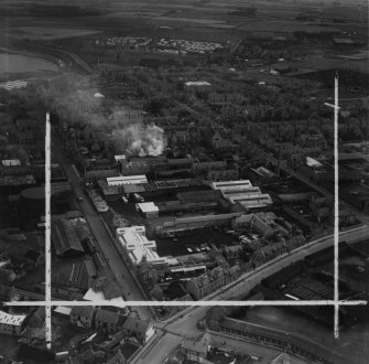 Peterhead, general view, showing James Sutherland (Peterhead) Ltd Bus Depot, St Peter Street and King Street.  Oblique aerial photograph taken facing west.  This image has been produced from a crop marked print.