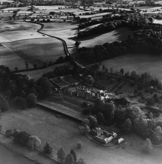 Abbotsford House and Grounds, Melrose.  Oblique aerial photograph taken facing east.  This image has been produced from a print.