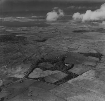 Foreland House and Loch Gorm, Islay.  Oblique aerial photograph taken facing north-west.  This image has been produced from a print.