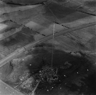 Kirk o'Shotts Transmitting Station, under construction.  Oblique aerial photograph taken facing north-east.  This image has been produced from a print. 