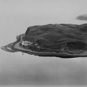 Island Davaar and Davaar Lighthouse.  Oblique aerial photograph taken facing south-east.  This image has been produced from a print.