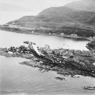 Mallaig, general view, showing Mallaig Harbour and Station.  Oblique aerial photograph taken facing east.  This image has been produced from a print.