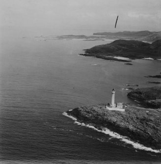 Ardnamurchan Lighthouse and Sanna Bay.  Oblique aerial photograph taken facing north-east.  This image has been produced from a damaged print.