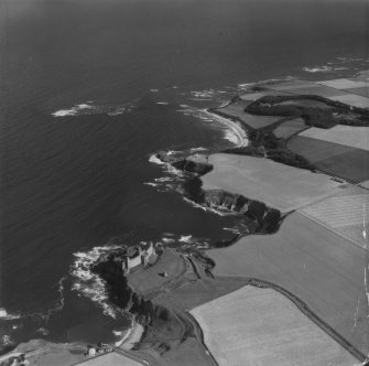 Tantallon Castle and Auldhame, general view.  Oblique aerial photograph taken facing east.  This image has been produced from a damaged print.