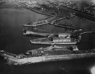Ardrossan Harbour.  Oblique aerial photograph taken facing east.  This image has been produced from a print.