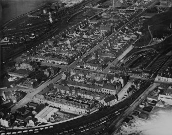Ardrossan, general view, showing Glasgow Street and Inches Road.  Oblique aerial photograph taken facing north.  This image has been produced from a print.