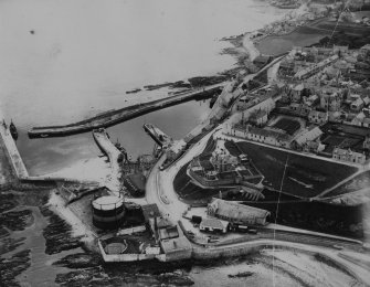 Banff Harbour.  Oblique aerial photograph taken facing south-east.  This image has been produced from a damaged print.