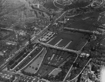 East Princes Street Gardens and Waverley Station, Edinburgh.  Oblique aerial photograph taken facing north-east.  This image has been produced from a print.