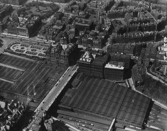 Waverley Station, North British Hotel and General Register House, Princes Street, Edinburgh.  Oblique aerial photograph taken facing north-west.  This image has been produced from a marked print. 