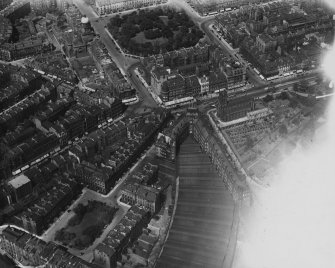 Edinburgh, general view, showing Caledonian Station and Charlotte Square.  Oblique aerial photograph taken facing north.  This image has been produced from a print.