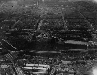 Edinburgh, general view, showing Edinburgh Castle and Queen Street Gardens.  Oblique aerial photograph taken facing north.  This image has been produced from a print.
