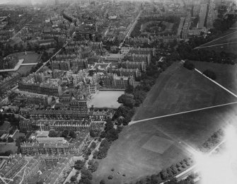 Edinburgh, general view, showing West Meadow Park and Royal Infirmary, Lauriston Place.  Oblique aerial photograph taken facing east.  This image has been produced from a print.