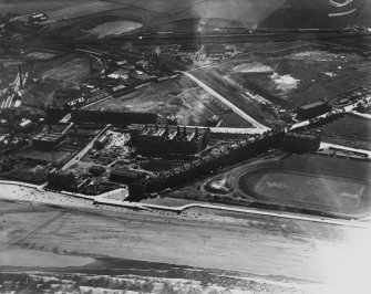 Portobello, general view, showing Portobello Power Station, Portobello High Street, under construction.  Oblique aerial photograph taken facing south-west.  This image has been produced from a marked print.