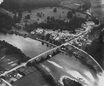 Dunkeld, general view, showing Dunkeld Bridge and Cathedral.  Oblique aerial photograph taken facing north-west.  This image has been produced from a damaged print.