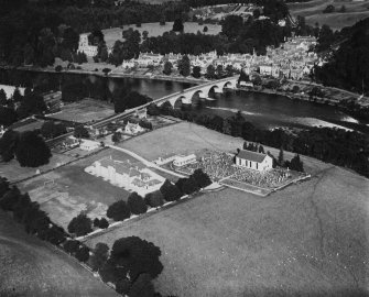 Dunkeld, general view, showing Little Dunkeld Parish Church and Dunkeld Bridge.  Oblique aerial photograph taken facing north-west.  This image has been produced from a print.