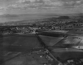 Dundee, general view, showing Pitkerro Road and Stobsmuir Park.  Oblique aerial photograph taken facing west.  This image has been produced from a print.